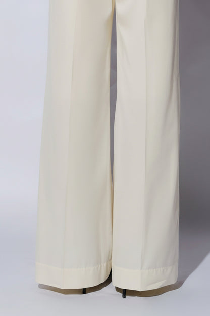 Ivory wide-leg pants worn by a person on a white background