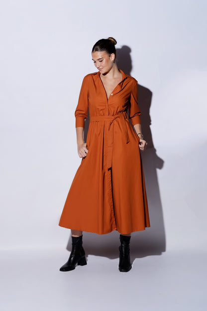 Refined event-ready dress with soft A-line silhouette and cultural yoke detail