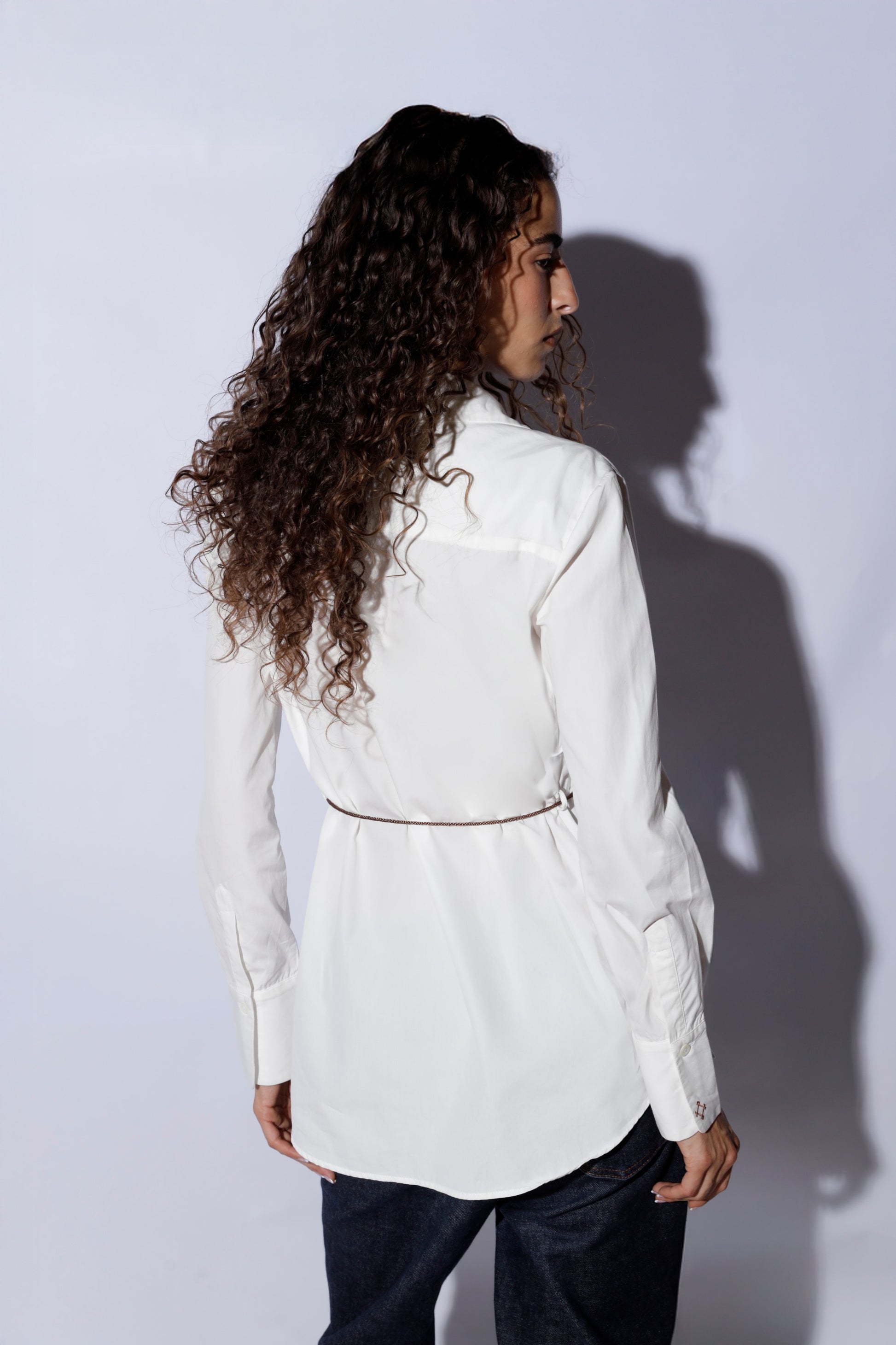 Woman wearing a white cotton shirt
